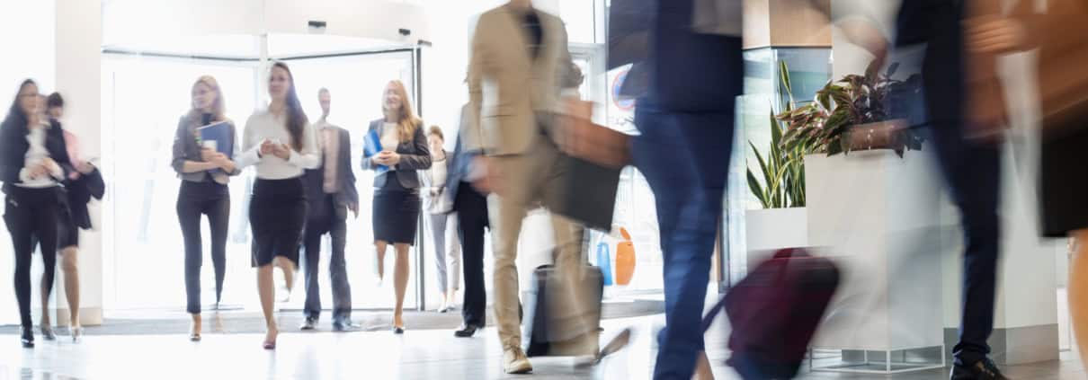 Business people in Canada walking and discussing Capital Gains Inclusion rate changes