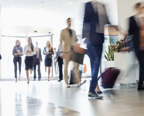 Business people in Canada walking and discussing Capital Gains Inclusion rate changes